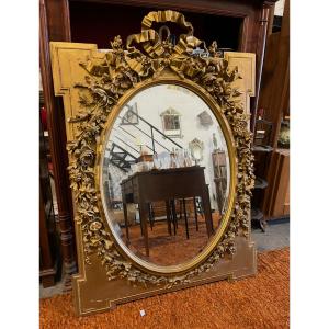 Gilded Mirror Decorated With Flowers And Bows