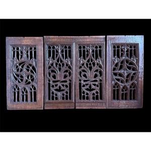 Série de quatre panneaux de chêne à motif gothique flamboyant à claire-voie. France, Normandie 