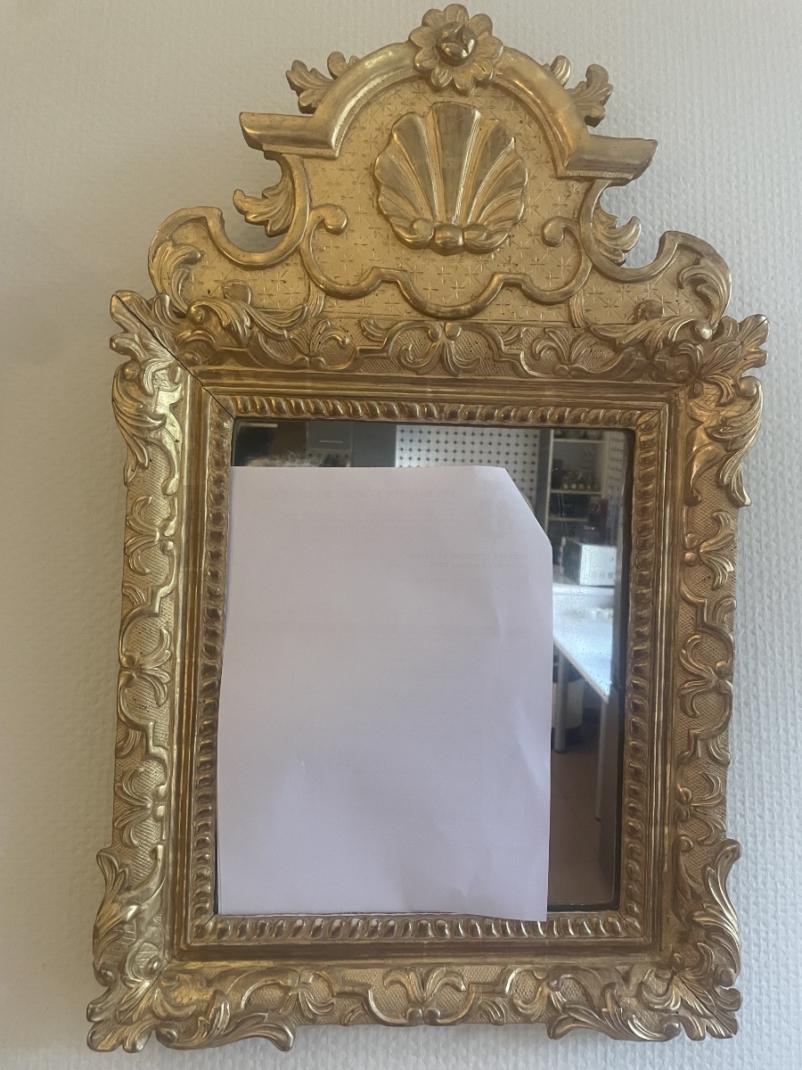 Miroir d’époque Louis XV en bois sculpté et doré 