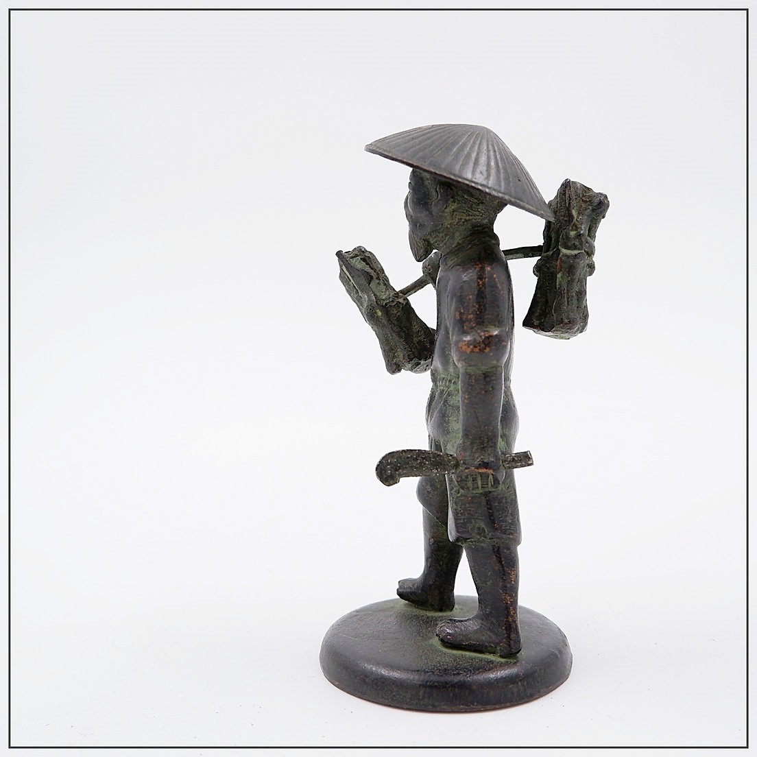 Figurine asiatique en bronze d'un paysan cueilleur de riz - XIXe