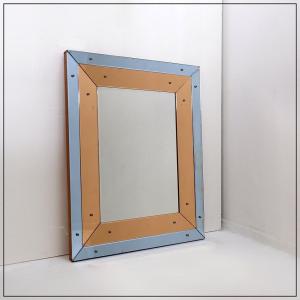Miroir mural biseauté à panneaux de miroir bleus et cuivrés - Italie, années 1930