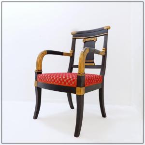 Fauteuil noir et "or" de style Empire - XIXe siècle