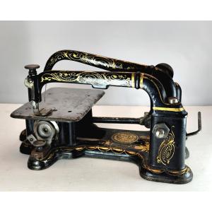 Machine à coudre Musée : Wheeler and Wilson, marquée, dorée, N°2, 1870