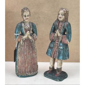 Couple de figurines en cire peinte, style Louis XIV, mains jointes