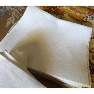 Suite de 11 très grandes serviettes de table à décor géométrique debut XXème