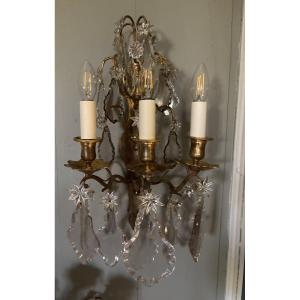 Paire de grandes appliques de style XVIIIème bronze et cristal