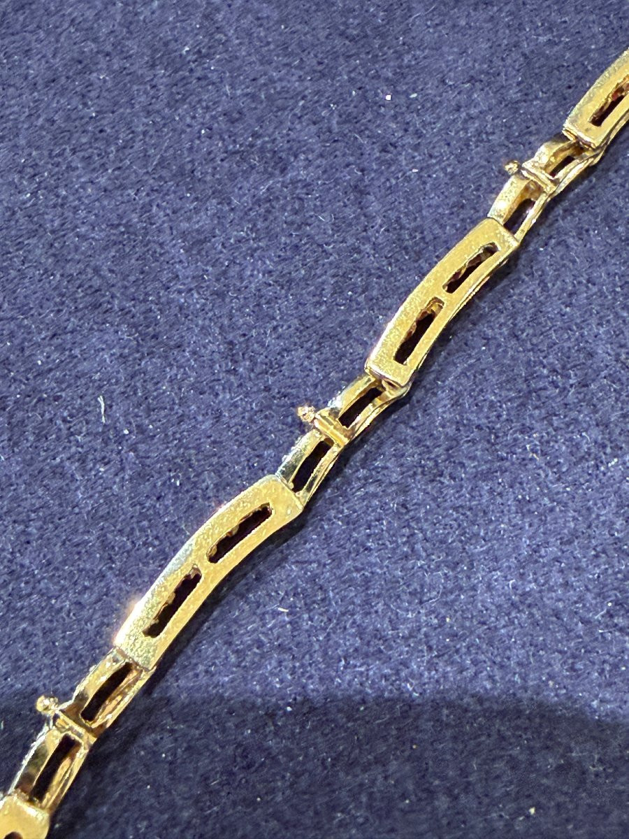 Bracelet articulé en or composé de maillons rubis et diamants-photo-1