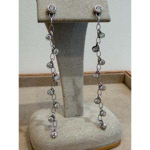 BOUCLES D'OREILLES EN OR GRIS CASCADE DE DIAMANTS