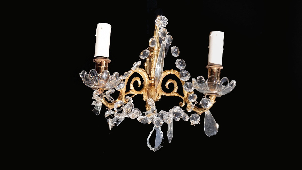 Paire d'applique en laiton et à pampilles , XXème 