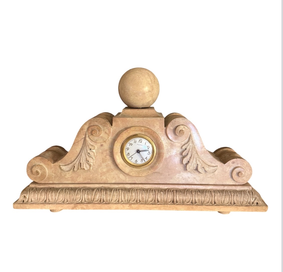 Pendule  en pierre sculptée Signée “SBERNA PIERRE”