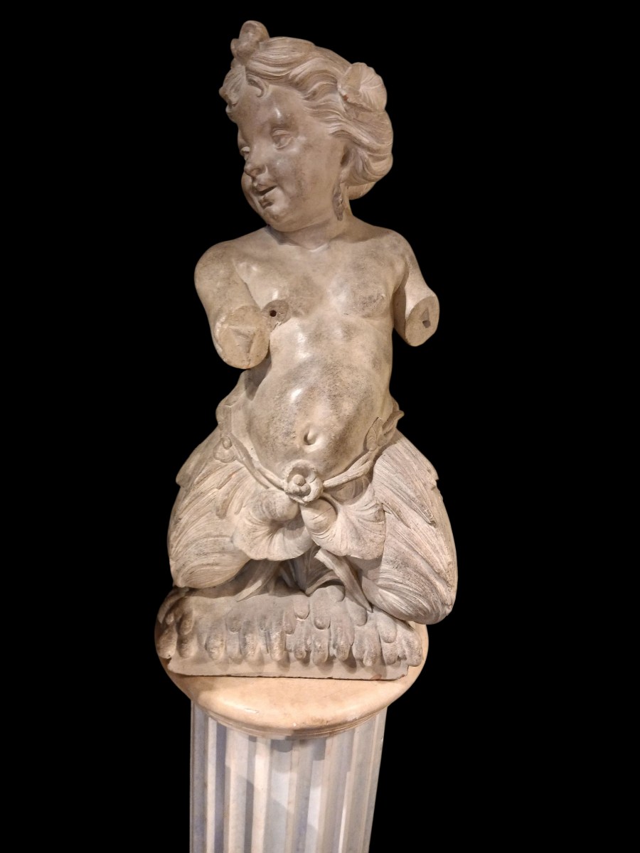 Sculptures de tritons terre cuite.