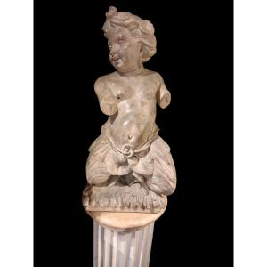 Sculptures de tritons terre cuite.