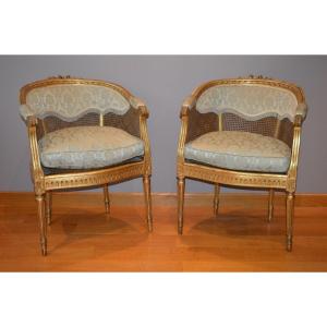 Pair Of Armchairs In Golden Wood And Canes In The Louis XVI Style.