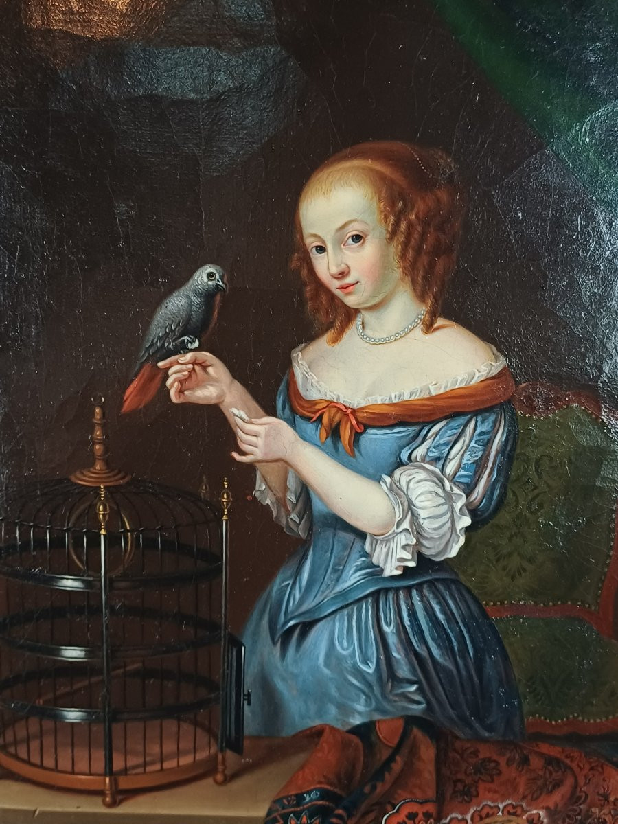 Hst Woman Feeding A Parrot Flemish School Of Aptres Jacob Ochtervelt-photo-1