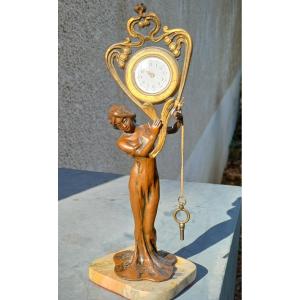 Pendule horloge de table art nouveau femme bronze porte montre