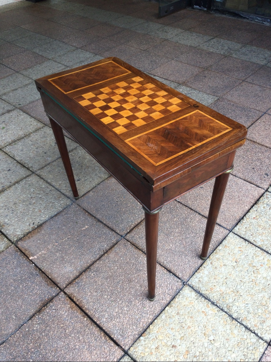 A Mahogany And Marquetry Games Table.