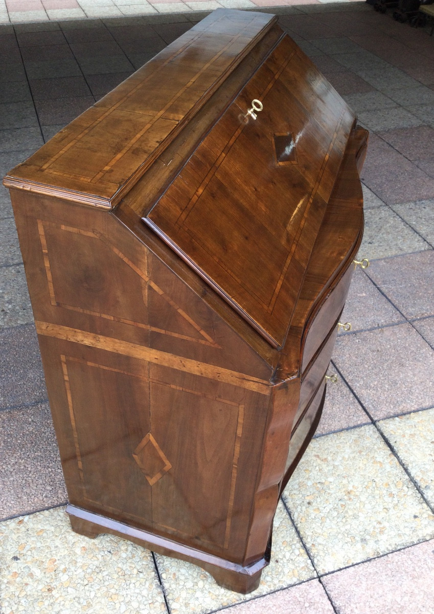 A Walnut Chest Of Drawers And Desk.