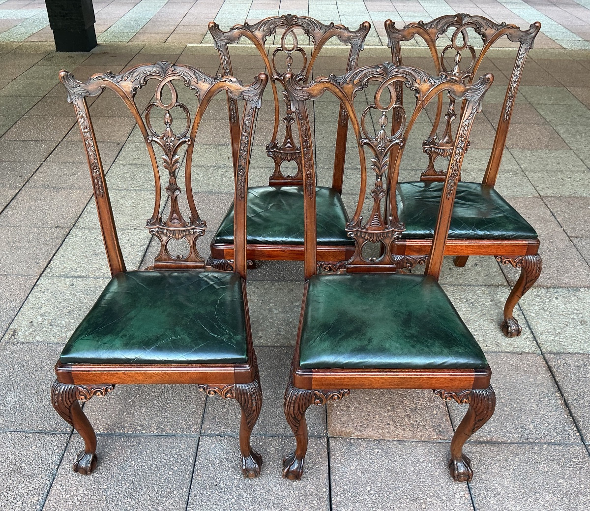 Four Chippendale Style Chairs.