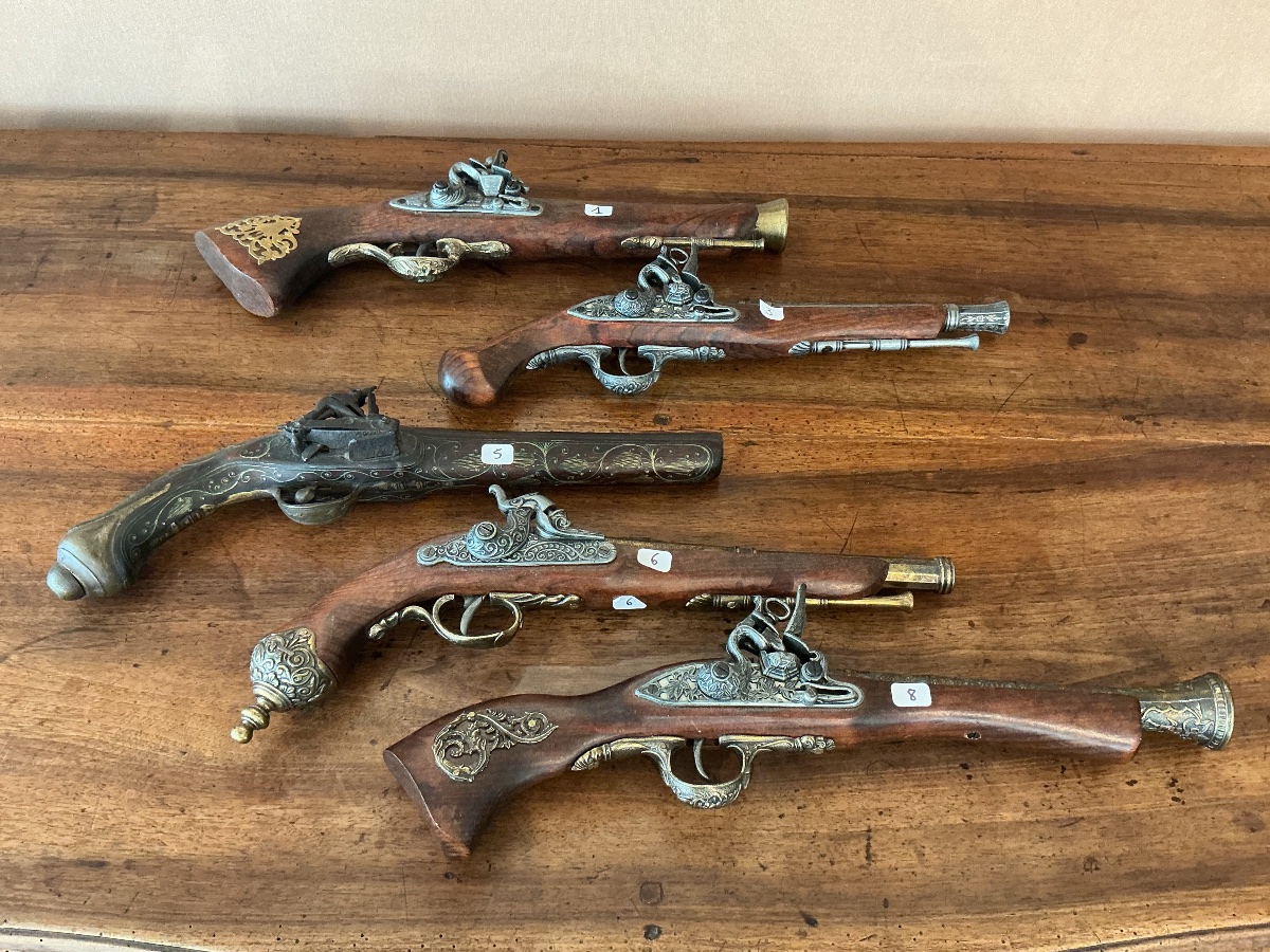 A Collection Of Decorative Pistols.