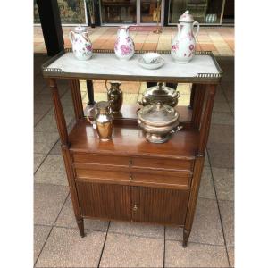 Une console- desserte de style Louis XVI en acajou