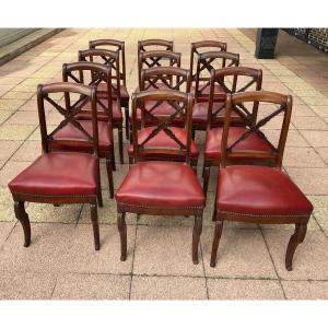 12 chaises en acajou.