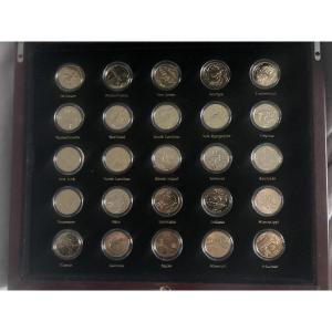 Box Containing 50 American Coins Plated In 24-karat Gold. 
