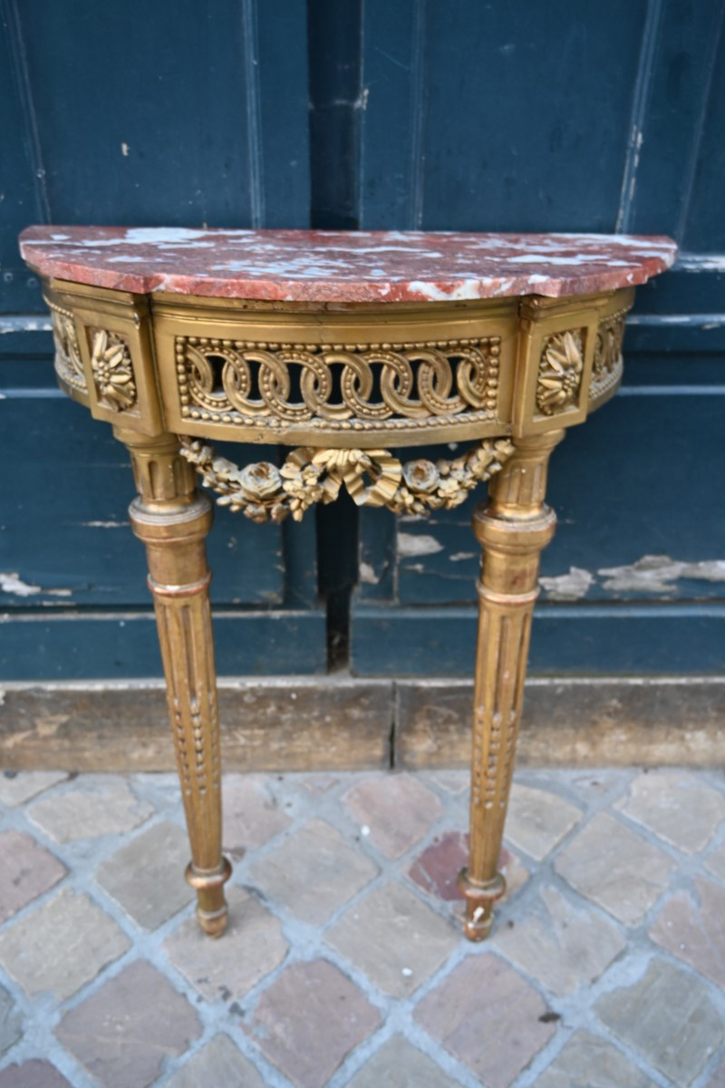 Console demi lune? bois doré  d époque Louis XVI 