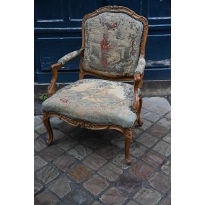 Fauteuil à dossier plat avec tapisserie aux points , d époque Louis XV