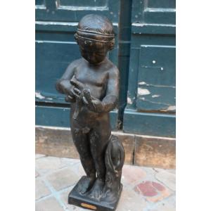 Sculpture en plomb de jardin jeune garçon à l oiseau d après Bridan