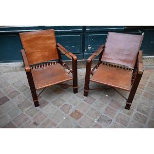 paire de fauteuil en cuir , genre Savane   , travail du XX