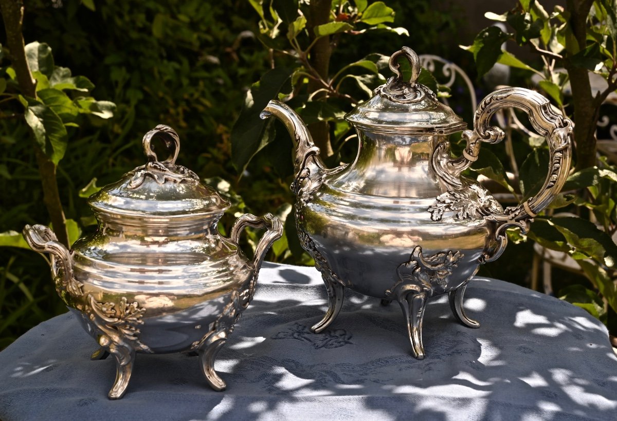 Teapot And Its Silver Sugar Bowl