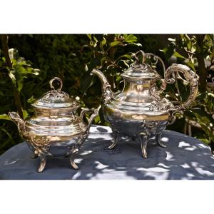 Teapot And Its Silver Sugar Bowl