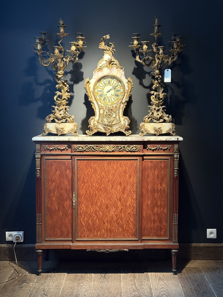 A Side Board In Marquetry And Finely Chiseled Bronze. 