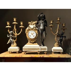 Pendule en régule & marbre avec paire de bougeoirs 
