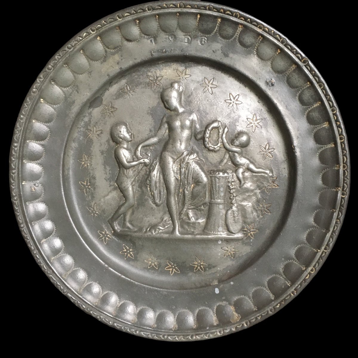 A Set Of Three  Tin Dishes With Relief Designs, 18th/19th Century 