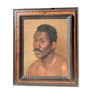 Portrait d’un homme moustachu originaire d’Asie du Sud-Est.