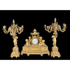 Grand garniture de cheminée en bronze doré. Paris, XIXe siècle