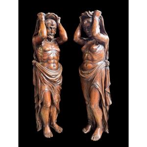 Paire de sculptures / cariatides de style Renaissance en chêne début XIXe
