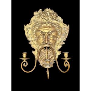Grande applique murale « Bacchus » en cuivre et laiton du XVIIIe siècle.