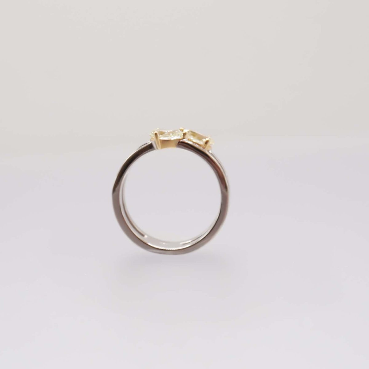 Ring Adorned With Pear-shaped Daffodil Diamonds And Baguette Diamonds-photo-2