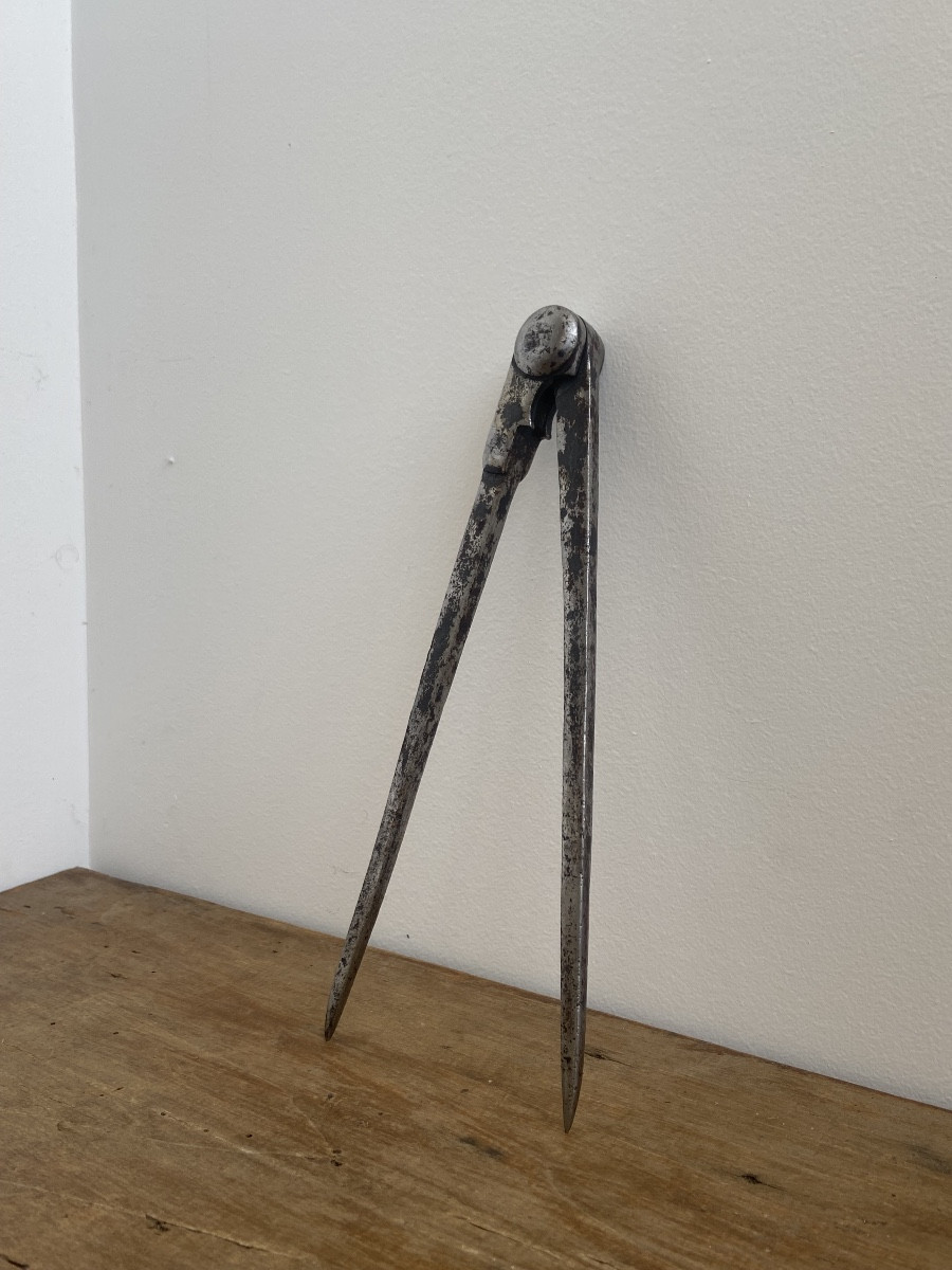 Compas tête d’homme, fer forgé, France début 18ème