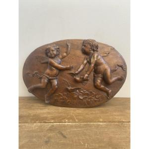 19th-century France: Putti In High Relief, Oval Wooden Panel