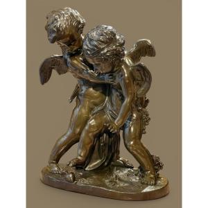 groupe en bronze patiné – Deux amours se disputant un cœur – Esprit Falconet – Milieu XIXe