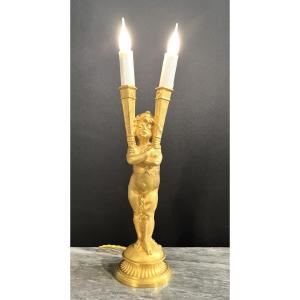 Joseph Chéret — Lampe à l’enfant en bronze doré à deux lumières