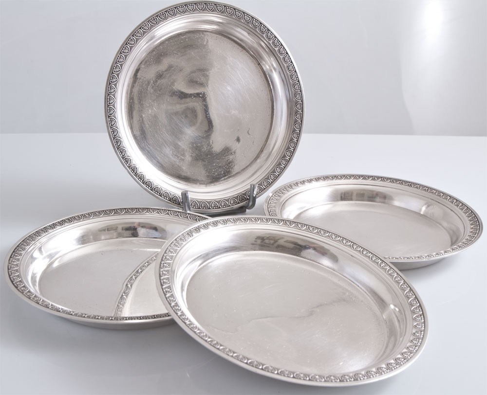 Christofle 4 dessous de bouteille métal argenté style empire