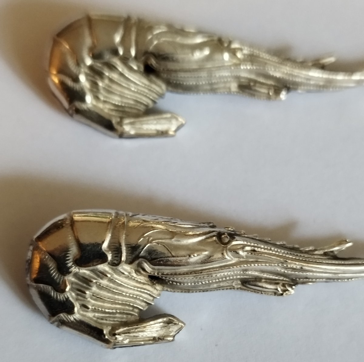 Two Silver Spoons Shaped Like A Lobster And A Seashell -photo-2