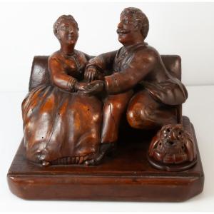 "La bague au doigt" encrier en bois sculpté