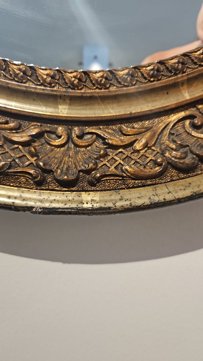 Miroir ovale en bois doré et sculpté-photo-2