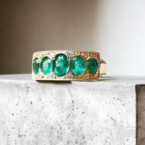 12ct Gold Five Stone Emerald Ring With Diamond Points