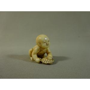 By Tomomasa, Japan Edo Period, (1630-1868) Netsuke Depicting A Boy Playing With A Turtle, Mid-19th Century